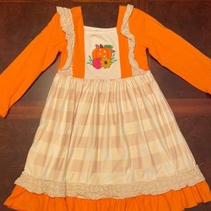 Pumpkin dress. Size large but fits like size 4.
